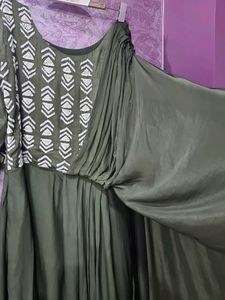 Beautiful Green Gown With Attached Falling Dupatta