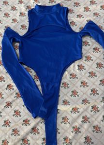 Stylish Blue Cut-out Top with Black Pants