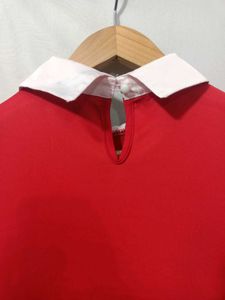 Chic Red Top with Sequin Embellishment