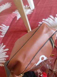 Sling  Bag with Pom Po