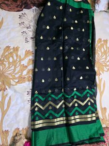 Elegant Black Saree with Gold & Green Border