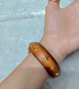 Trendy Wooden Bangles with Star Embellishments