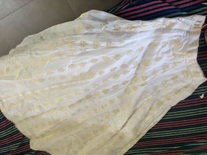 Elegant White Skirt with Golden Motif