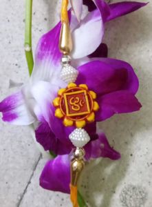 7 Assorted Rakhi Bracelets with Ornate Designs