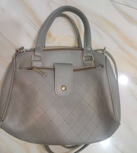 Grey sling bag
