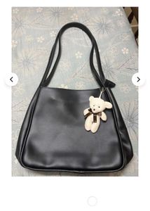 Chic Cream Shoulder Bag with Cute Charm