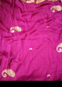 Vibrant Pink Saree with Golden Paisley