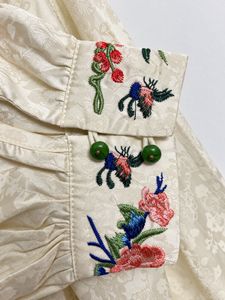 Elegant Cream Embroidered Blouse
