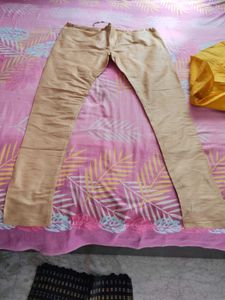 Manyavar Men's Yellow Kurta with Beige Pants
