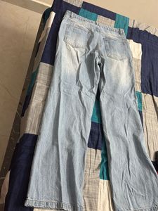 Ripped Knee Jeans