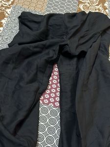 Elegant Black Palazzos with Embroidered Hem