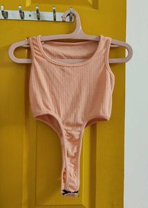 Peach Ribbed Bodysuit