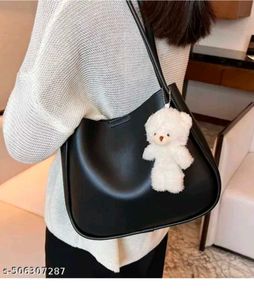 Chic Cream Shoulder Bag with Cute Charm
