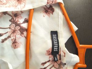 Wrap dress, with floral detailing