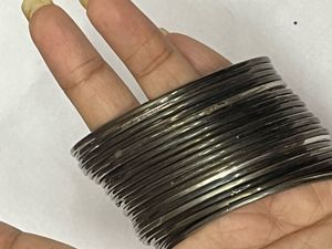 Stack of Elegant Black Bangles
