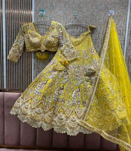 Exquisite Yellow Peacock Embroidered Lehenga Choli