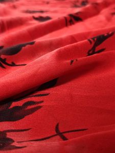 Vibrant Red saree with Black Print