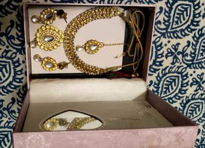 Beautiful yellow kundan and pearls Set