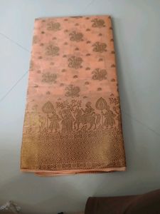 Elegant Peach Saree with Intricate Gold Print