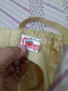 2 Beige &amp; White Bras