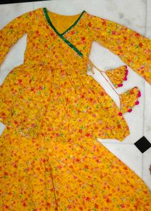 Yellow Floral Lehenga Choli with Pom-Pom Tassels