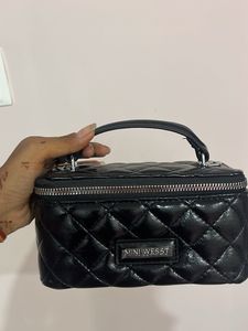 Mini Westt Quilted Clutch