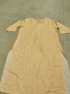 Elegant Yellow Striped Kurta with Tassel Detail
