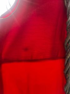 Red Embroidered Sleeveless Kurta.
