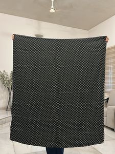 Black polka dot satin silk fabric