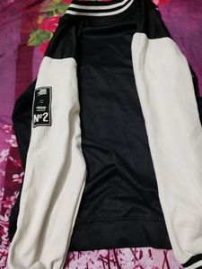 Trending Black Jacket For Both Men And Women.it is Medium Size