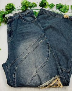 Distressed Wide Leg Denim Jeans