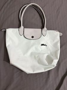 Stylish Teal Hobo Bag with Flower Accent