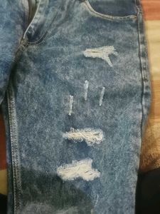 Distressed Blue Denim Jeans