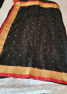 Elegant Black Saree with Gold &amp; Red Border