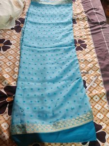 A Nice Sky Blue Saree With Beads