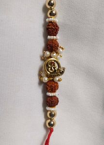 Designer Rakhi with Om Pendant