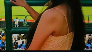orange coloured sleeveless top