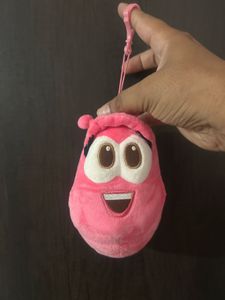 pink Larva character plush keychain featuring