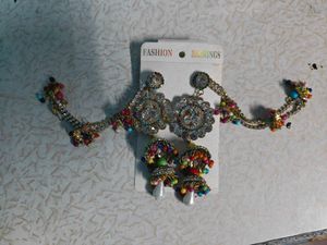 Exquisite Jhumka Earrings with Chain