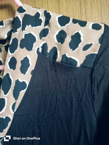 Chic Black Top with Animal Print Collar