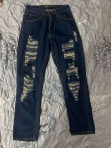 Distressed Blue Denim Jeans