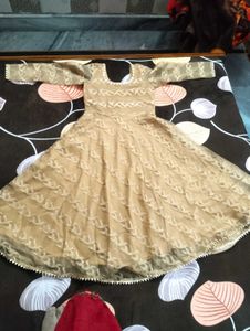 It's Beige color Gown.  I