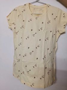 Peach coloured short sleeved tshirt