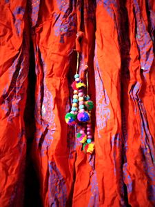 Ethnic skirt, deep Orange colour with blue print.