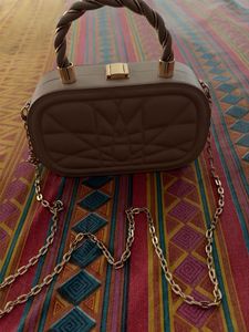 Quilted Oval Handbag