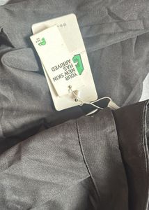 NEWME Black Wide-Leg Overlay Drawstring Trousers.
