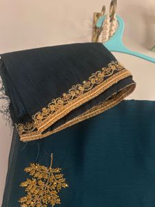 Elegant Teal Saree with Gold Embroidery