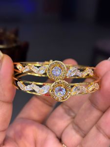 Elegant Gold Tone Bangles with Crystal Accents