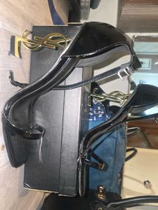 YSL opyum heels black and gold
