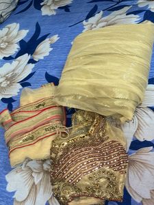 golden bridal type lehanga with blouse and duppata
